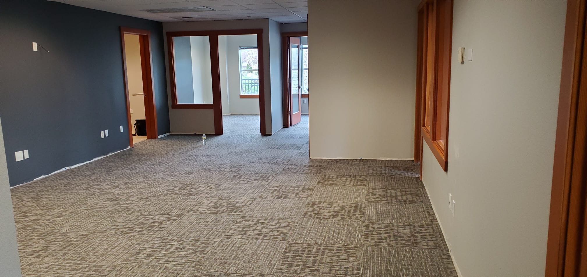 Patterned carpet tile covering an open commercial office floor